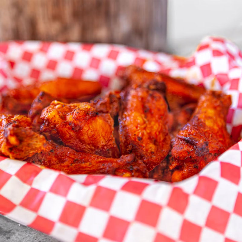 spicy-sauced-wings The Bucket wings
